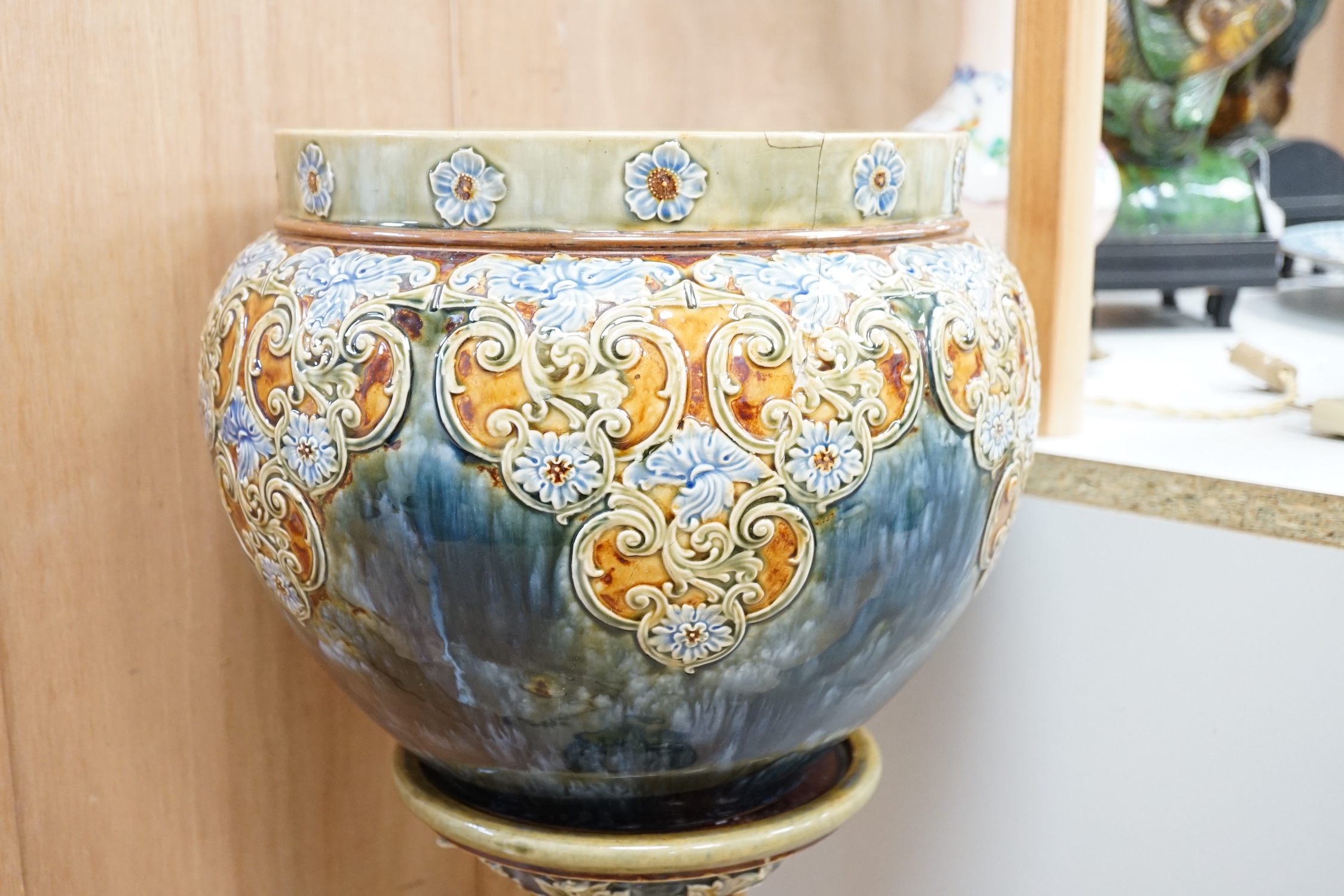 A Royal Doulton stoneware jardiniere and pedestal (cracked), 104cm